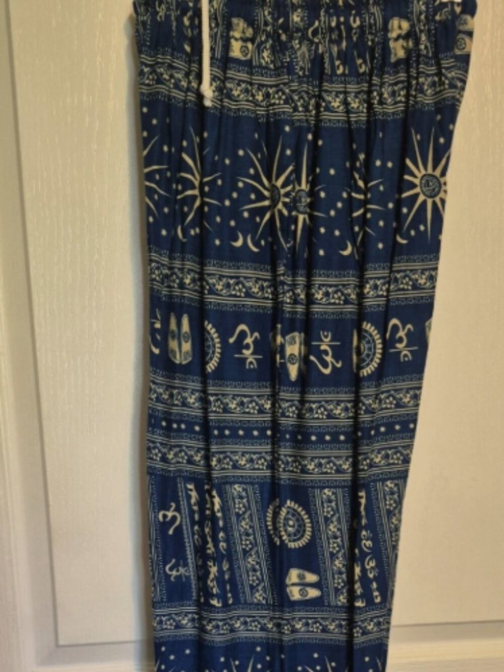 Om Print Pants Harem pants with pockets Blue